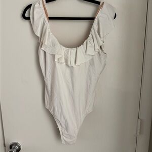 Woman’s Ruffled White One Piece